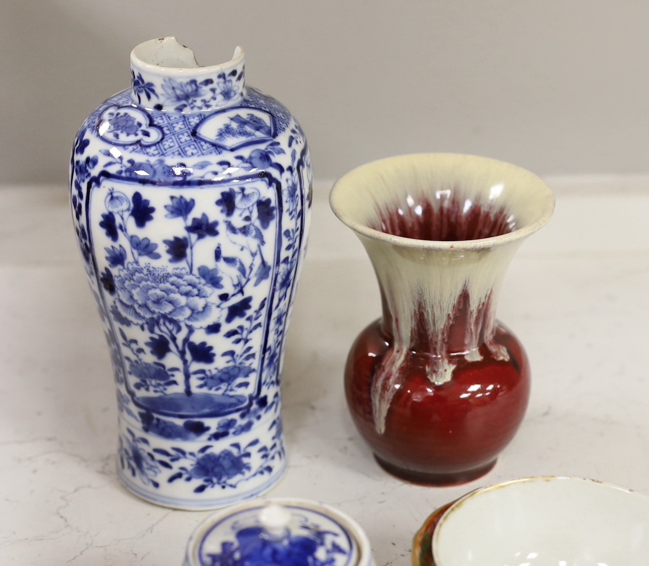 A group of mixed Chinese porcelain, 18th century and later, tallest item blue and white vase 29cms high.